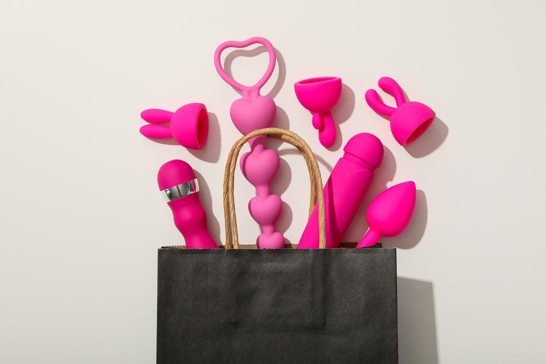 gift bag with pink sex toys and attachments